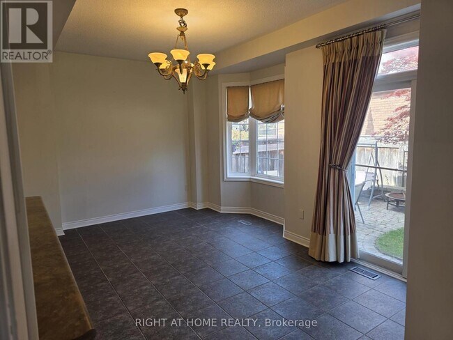 Building Photo - 102 Cormorant Crescent