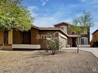 Building Photo - 8757 W Windrose Dr