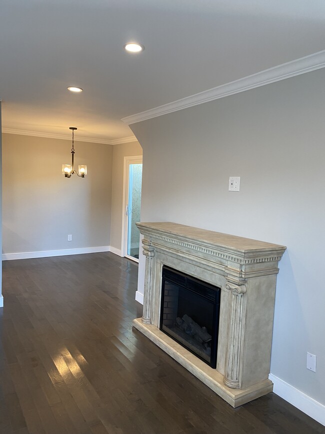 Living Room with electric fireplace - 1809 Speyer Ln