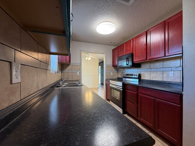 Building Photo - REDUCED RENT!! AVAILABLE NOW!! Lovely 4-bedroom home in South OKC!