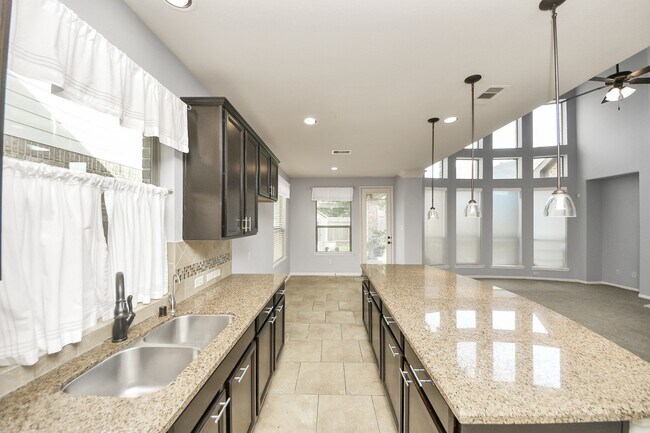 Foto del edificio - 20714 S Blue Hyacinth Dr