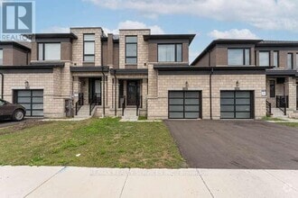 Building Photo - 203 HUNTINGFORD Trl