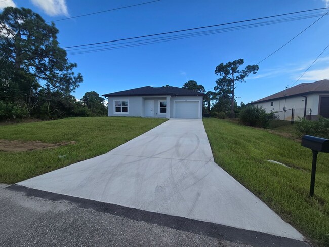 Building Photo - BRAND NEW 2/2/1 -SW LEHIGH ACRES