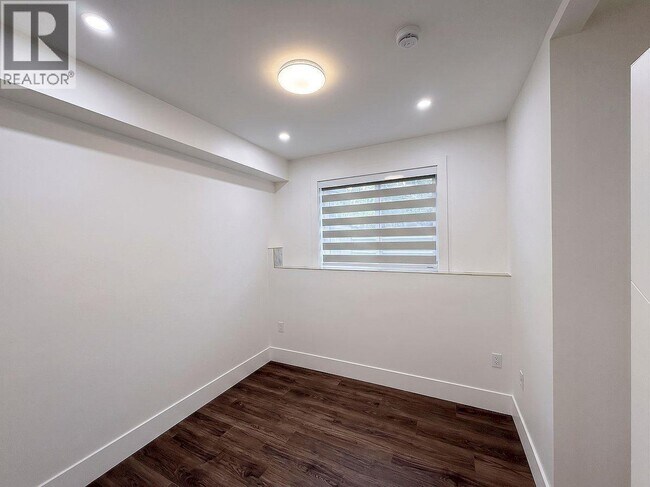 Photo du bâtiment - 10XX E 62nd Ave