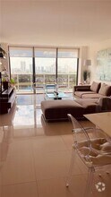 Building Photo - 3675 N Country Club Dr