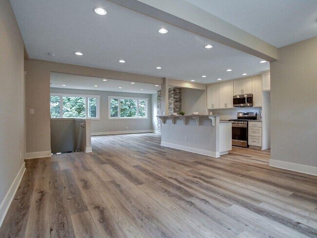 Dining room looking into living room and kitchen - 13756 John Jeffrey Ct