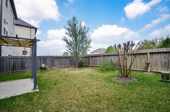 Building Photo - 10210 Spring Shadows Park Cir