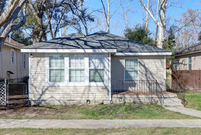 Building Photo - Renovated Single Family - Three Bedroom, Two Bathroom