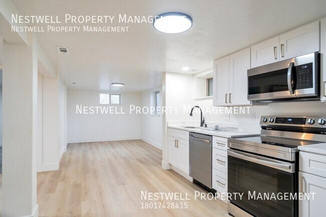 Building Photo - $500 OFF 1ST MONTH'S RENT - 2-bed Basement...