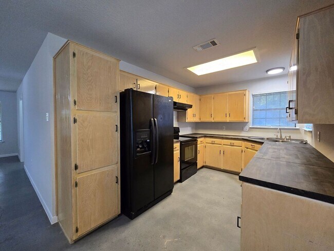 Building Photo - NEW IN MANAGEMENT & RENT REDUCTION - AVAILABLE NOW!