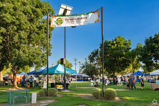Residents flock to the annual Dinuba Farmers Market for treats and music.
