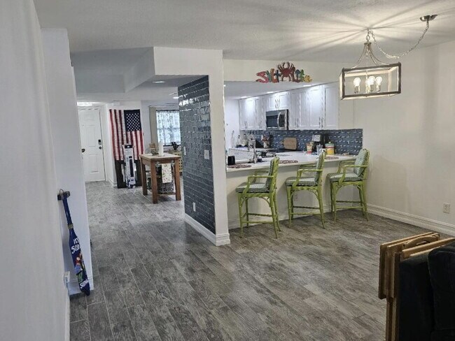 Building Photo - "Discover Coastal Comfort: Spacious 2-Bed,...