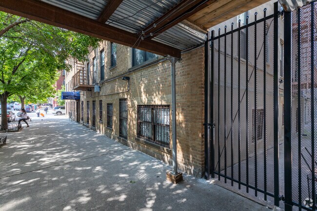 Building Photo - Academy Twins Condominium