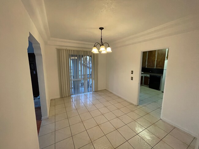 View from hallway, kitchen on the right, living room on the left - 2817 S Sycamore Ave