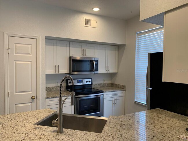 Foto del edificio - 9324 Lake Chase Island Way