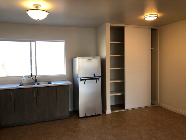 Whirlpool stainless steel refrigerator & pantry - 4633 Lexington Ave