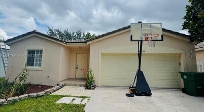 Building Photo - 10420 SW 24th Ct