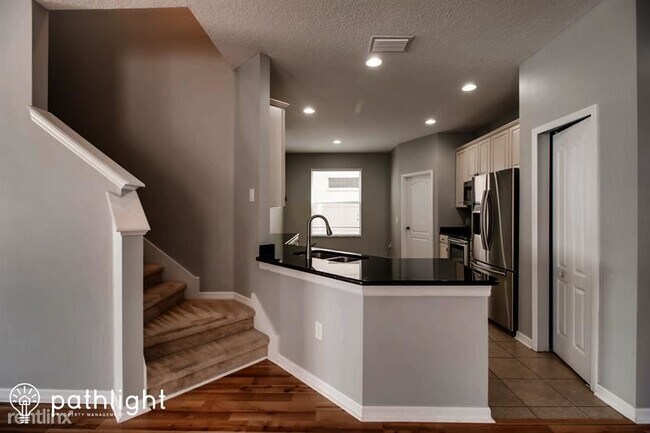 Building Photo - 4 br, 3 bath House - 12801 Tikal Way UNIT