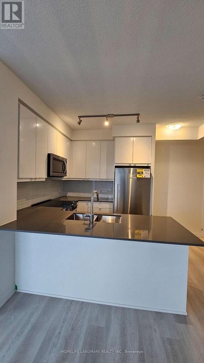 Photo du bâtiment - 3260 Sheppard Ave E