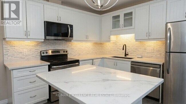 Photo du bâtiment - 1460 Highland Rd W