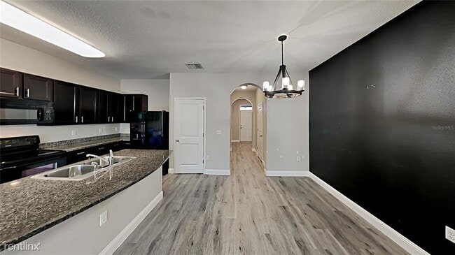 Building Photo - 3 br, 2.5 bath Townhome - 8980 Indigo Trai...