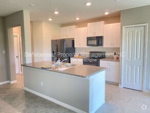 Building Photo - 7049 Samuel Ivy Dr