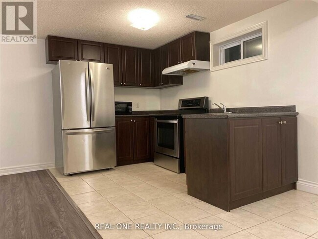 Photo du bâtiment - 73 Romfield Circuit