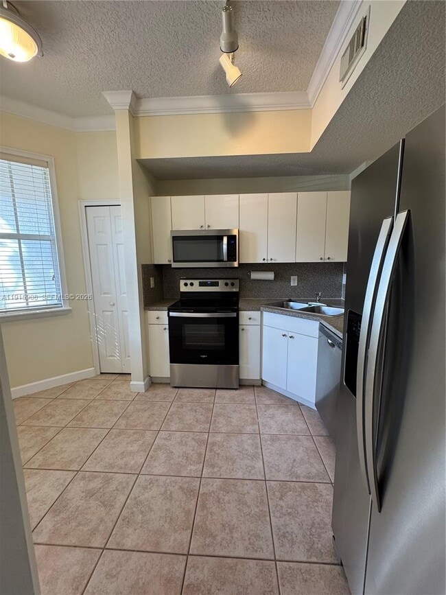 Building Photo - 10159 NW 43rd Terrace