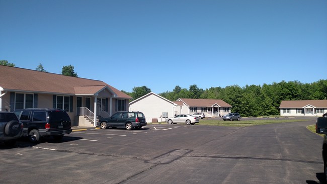 Building view/ Parking lot - Countryside Apartments