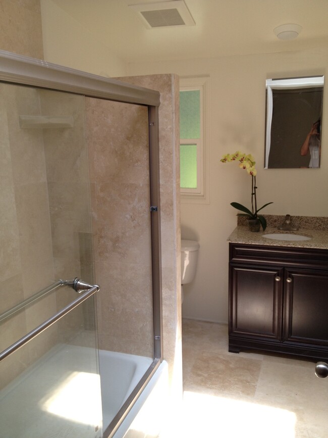 Bathroom, travertine shower - 3463 Mandeville Canyon Rd