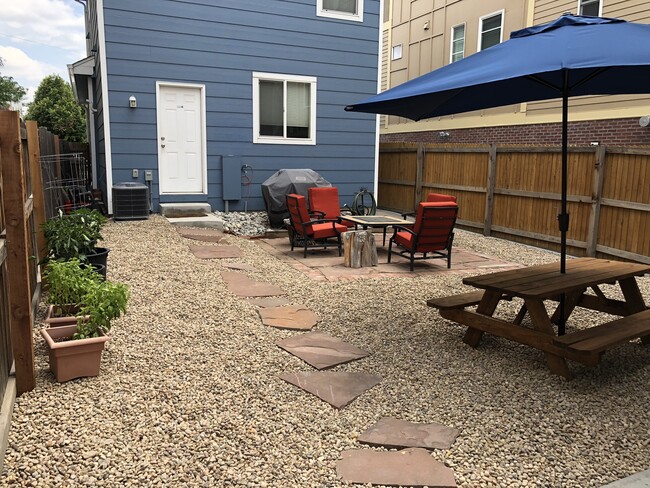 Grill and patio furniture included - 2947 Lawrence St