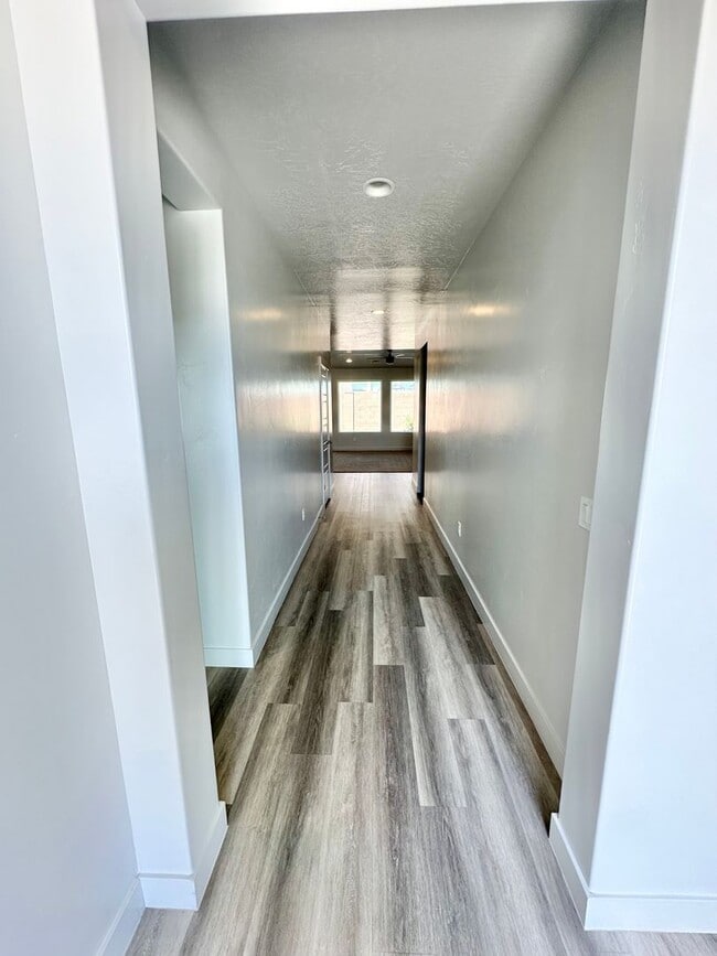 Building Photo - Desert Edge Home!  4 car garage! Price red...
