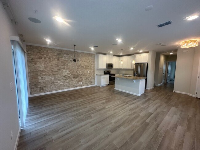 Building Photo - New 4 Bedroom 3 Bath 1 Car Garage Townhome