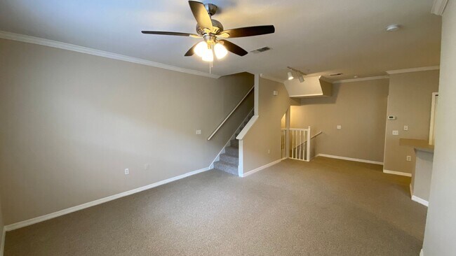 Building Photo - Spacious 2BR/2BA Visconti Townhome with 2-Car Garage, Den and Washer/Dryer!