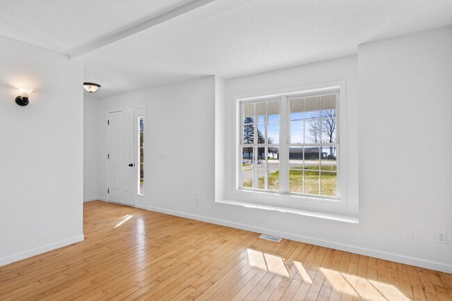 Building Photo - Charming 3+ Bedroom Cape Cod with Water View – Between Traverse City & Suttons Bay