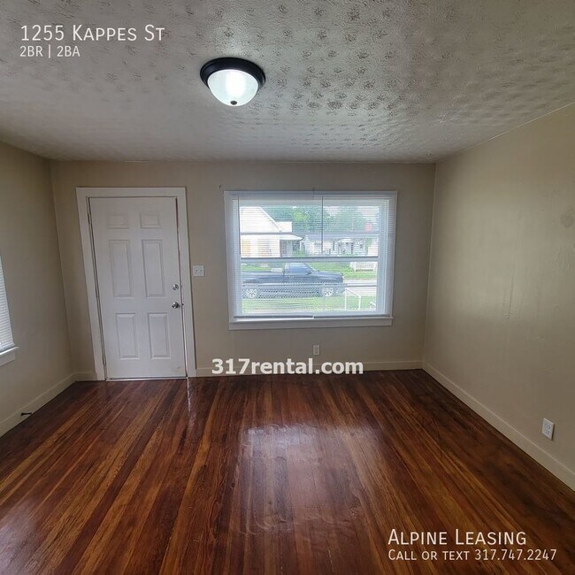 Building Photo - West Indy 2BR/2BA House w/Garage!