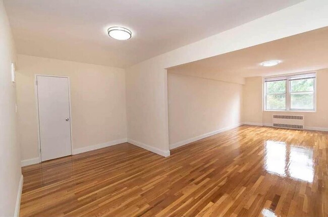 Building Photo - 55-05 Woodside Ave