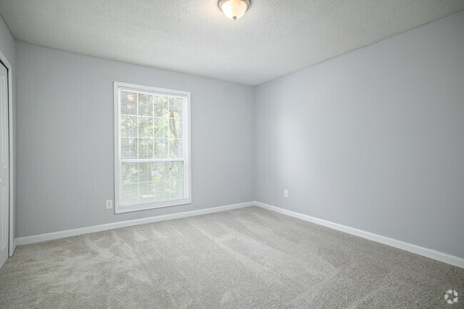 2BR, 2BA - 1,147SF - Primary Bedroom - Kristopher Woods Apartments