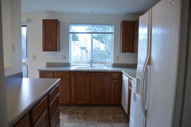 Building Photo - Beautiful and Bright Corner Lot Home in Ev...