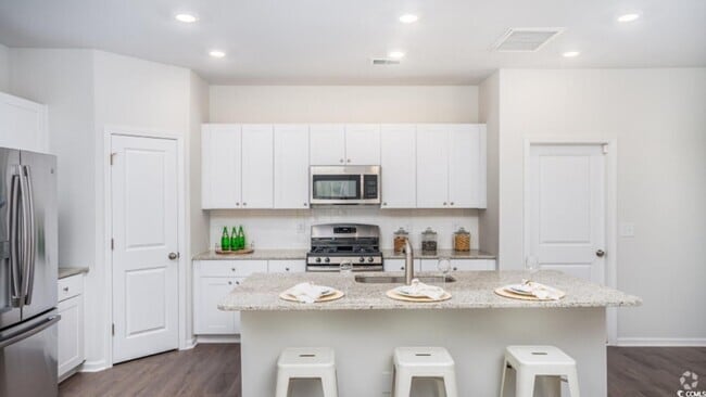 Building Photo - 407 Ladyfish Loop NW