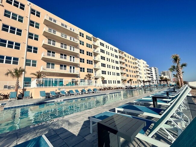 Hang out and unwind with the soothing rhythm of ocean waves—your perfect escape for relaxation and connection. - Triton Cay - Daytona Apartments
