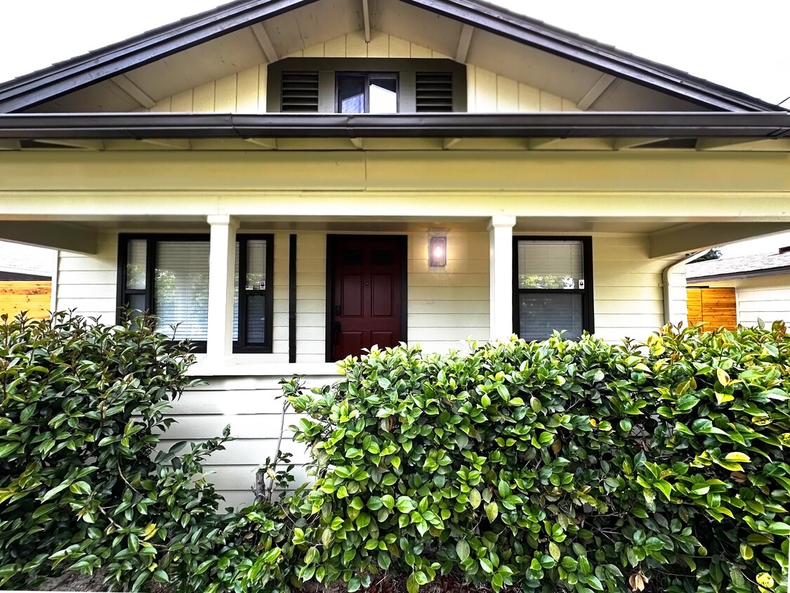 Charming curb appeal with a freshly updated exterior and welcoming front porch. - 4570 58th St