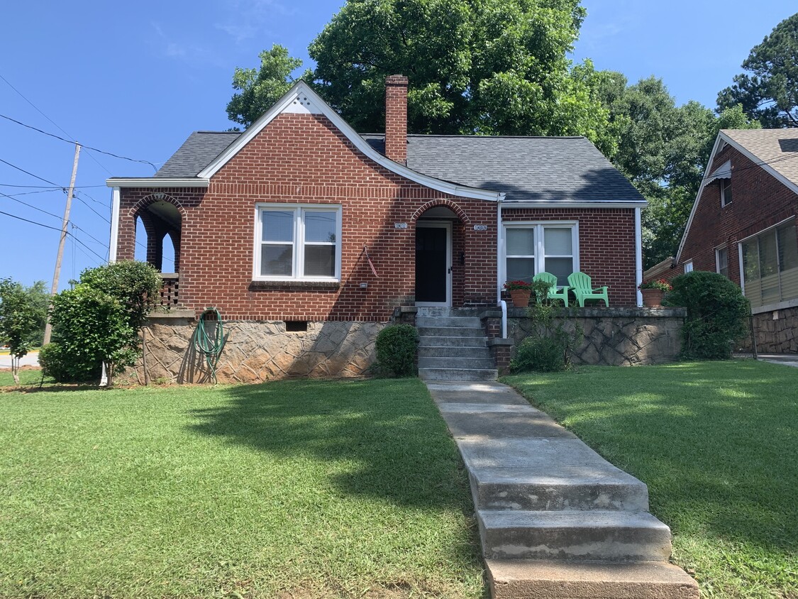 This unit is the left side of this duplex. 2 private entrances & private porch. - 1411 Winburn Dr