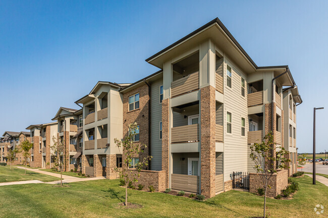 Building Photo - The Trails at the Crossings