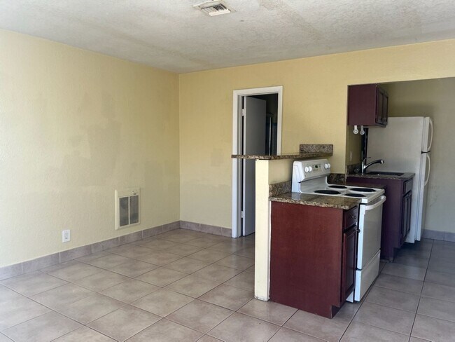 Building Photo - TRIPLEX