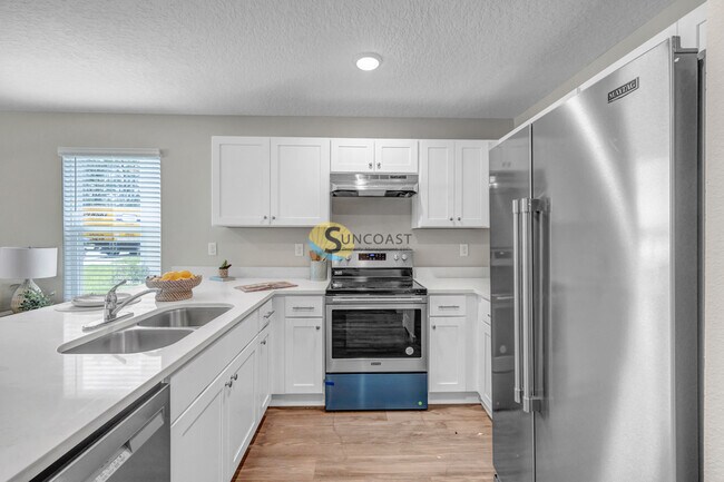 Foto del edificio - 6505 Breezy Oaks Wy
