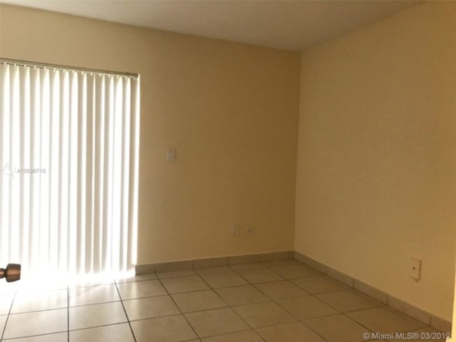Building Photo - Updated 1/1 on first floor of Gated Community