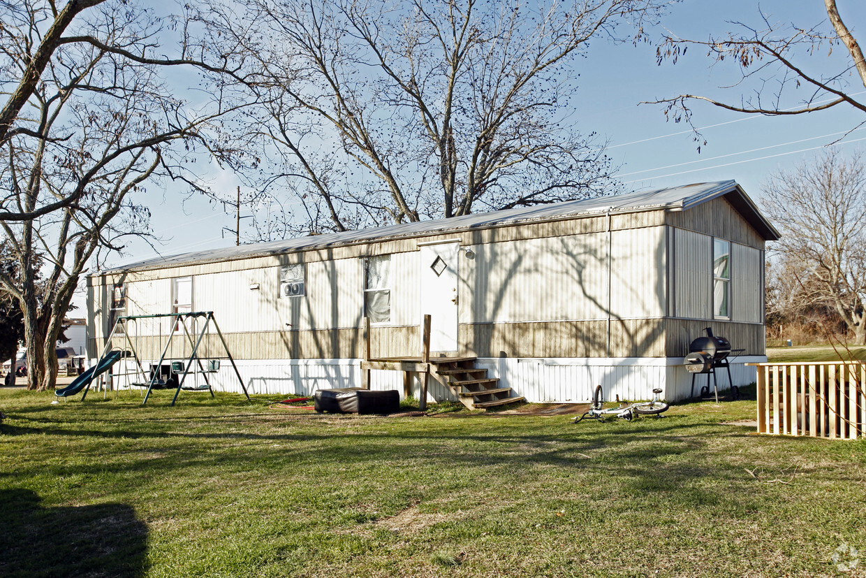 Building Photo - Trinity Mobile Village