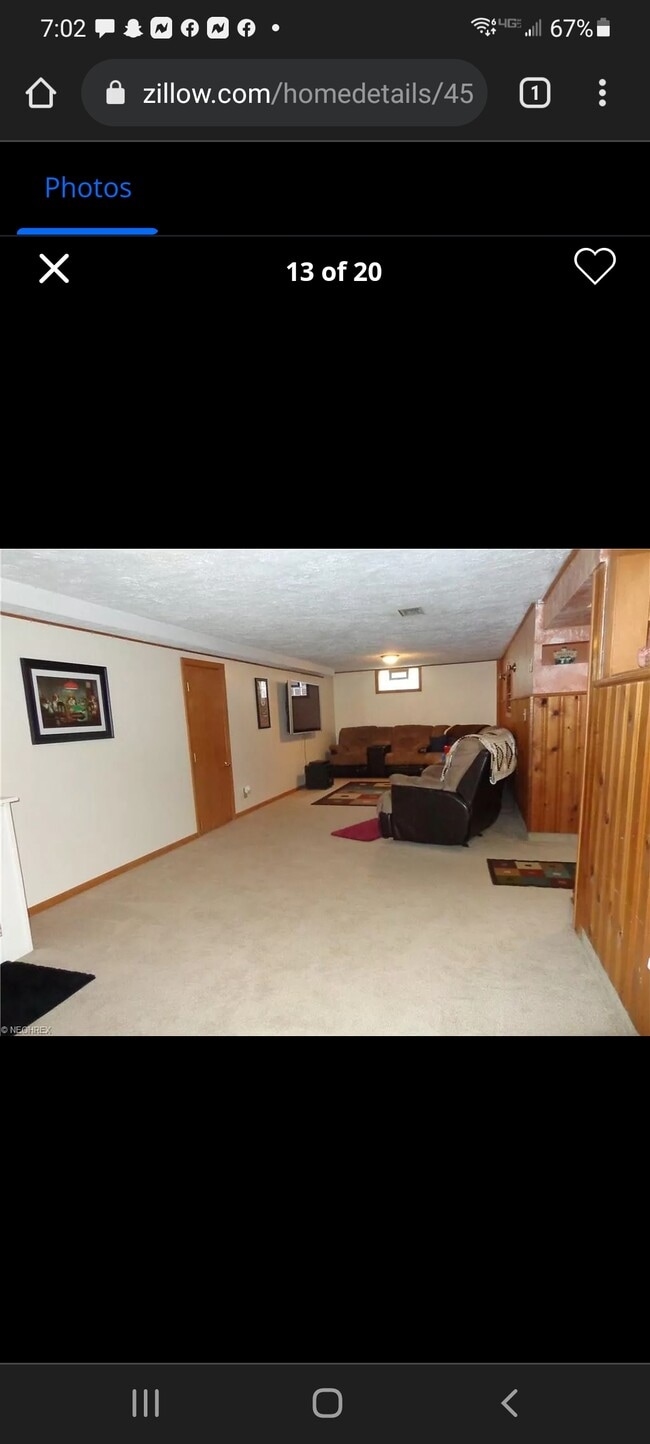 Finished basement with sectional and 60 inch plasma - 4560 7th St NW