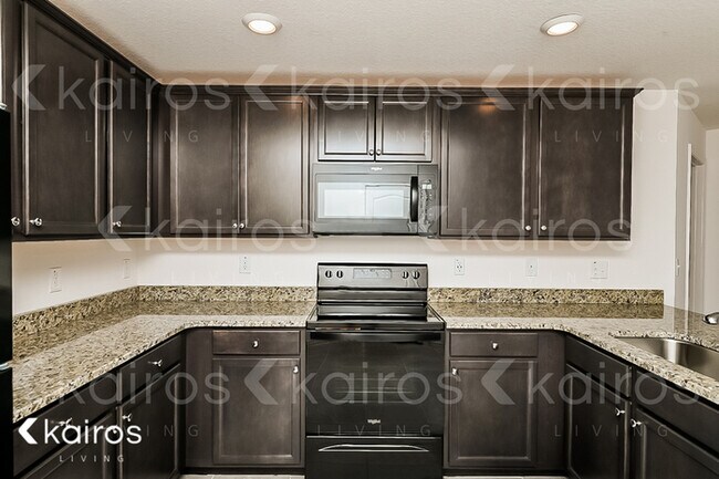 Building Photo - 8409 Indian Laurel Lane